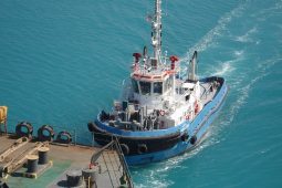 Tugboat approaching vessel at Ras Laffan Port