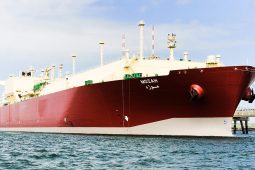 Nakilat's flagship Q-Max LNG carrier Mozah berthed at a terminal.