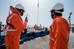 Nakilat agents overseeing the cargo loading process on a support vessel bound for anchorage